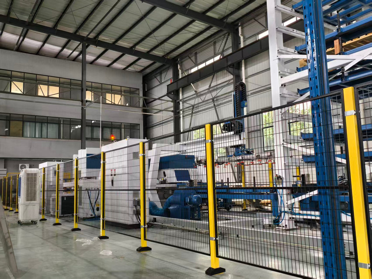 LY-MP-01 standard installation reference - black mesh with yellow posts around production equipment